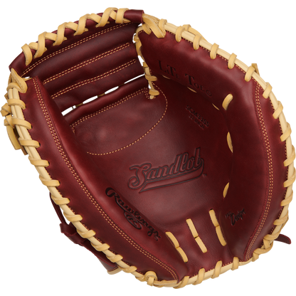 The Rawlings Sandlot 33" Baseball Catcher's Mitt (SCM33SS) features brown oiled leather with tan lacing and Sandlot branding on the palm, displayed against a plain white background.