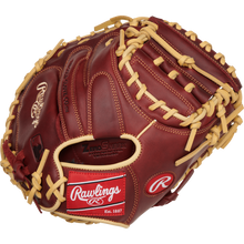 A Rawlings Sandlot 33" Baseball Catcher's Mitt (SCM33SS) in brown and tan features sturdy laces, oiled leather, and a visible Rawlings logo with a red "Rawlings Est. 1887" patch near the wrist area.