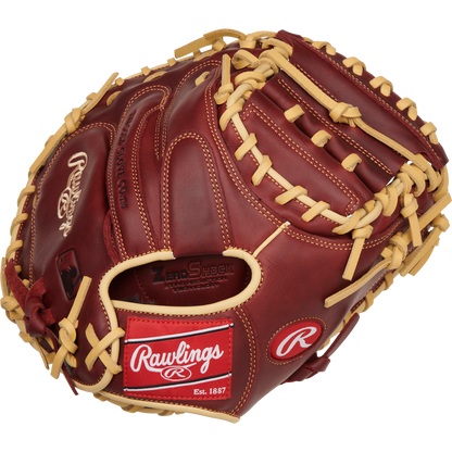 A Rawlings Sandlot 33" Baseball Catcher's Mitt (SCM33SS) in brown and tan features sturdy laces, oiled leather, and a visible Rawlings logo with a red "Rawlings Est. 1887" patch near the wrist area.