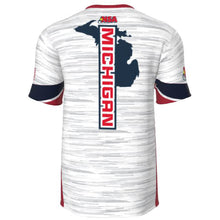 Back of a DSG Apparel NSA Michigan Super State Sublimated Slowpitch Tournament Shirt in white, with blue/red accents, blue Michigan silhouette, bold red "MICHIGAN" down the back, and NSA printed at the top.