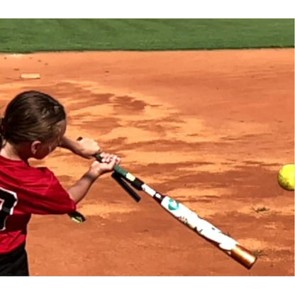A girl uses the SWINGRAIL Baseball & Softball Swing Trainer by SWINGRAIL to improve her bat speed and boost performance.