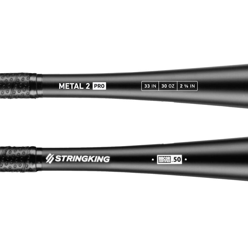 Two black StringKing BBCOR bats are shown up close—one is the 2022 Metal 2 Pro (-3) SKMTL2PRBB, labeled 33 IN, 30 OZ, 2⅝ IN; the other reads STRINGKING and is BBCOR Certified .50. Both have textured grips.