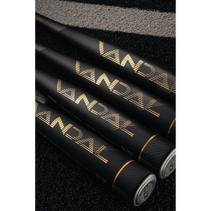 Three 2022 Victus Vandal 2 (-8) USSSA baseball bats from Victus, featuring "VANDAL" in gold, are lined up on a black and gray textured surface with their handles pointing away and barrels together in the foreground.