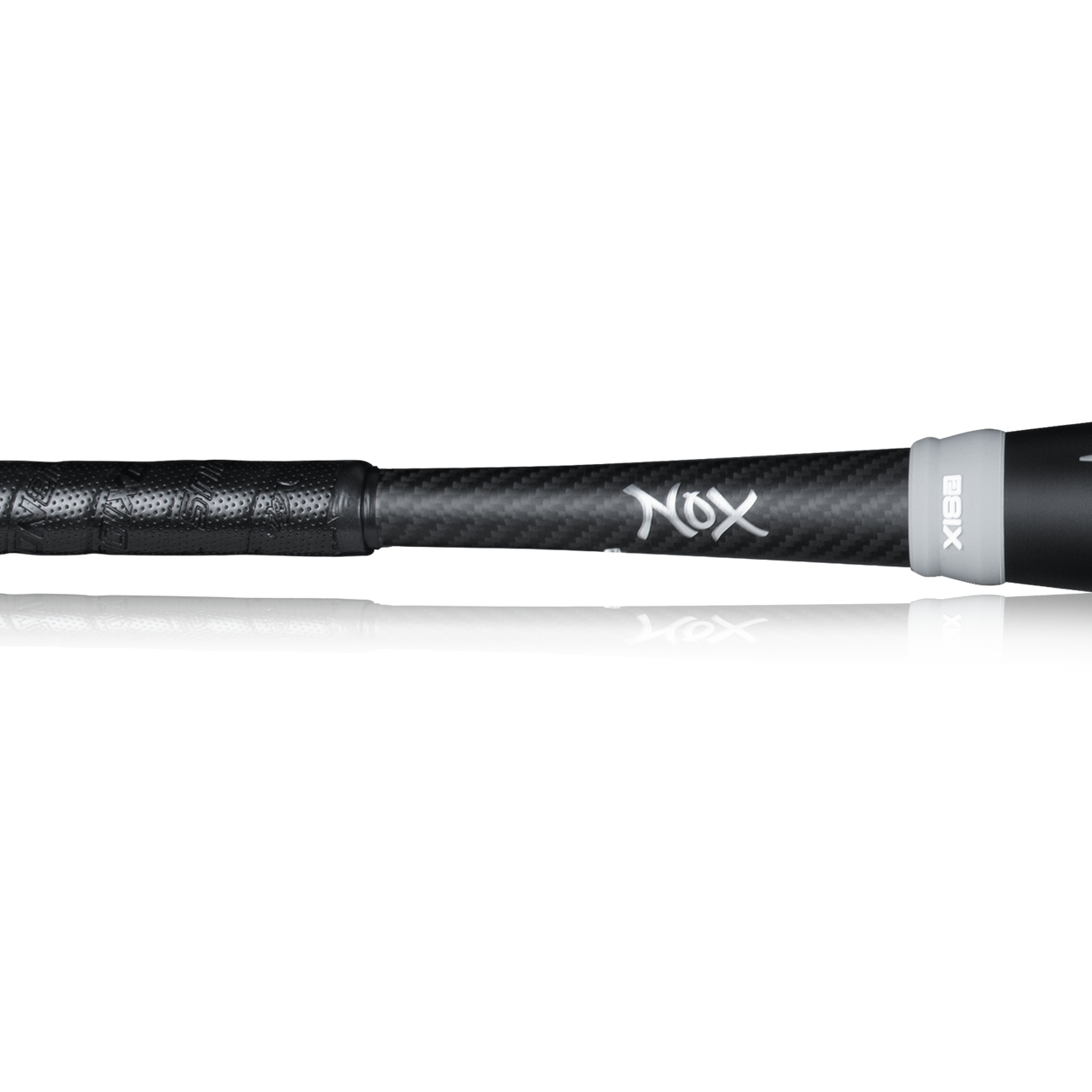 Close-up of the black handle and lower shaft on the 2023 Victus NOX 2 (-8) USSSA Baseball Bat, showing its textured grip and white NOX logo over a carbon fiber surface for improved control.