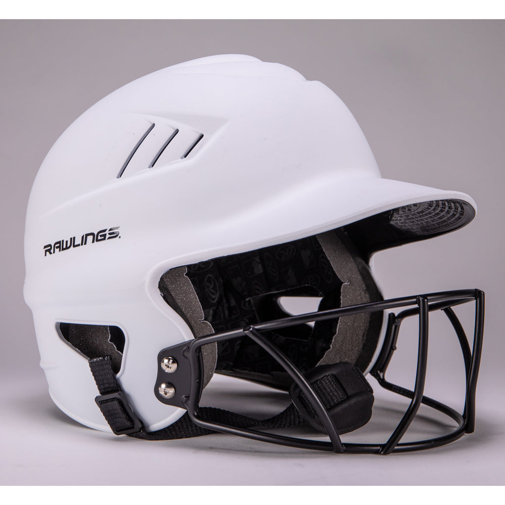 A Rawlings Coolflo Highlighter Matte Batting Helmet with Mask (RCFHLFG) in white, featuring a black metal faceguard and chin strap, is displayed against a plain gray background.