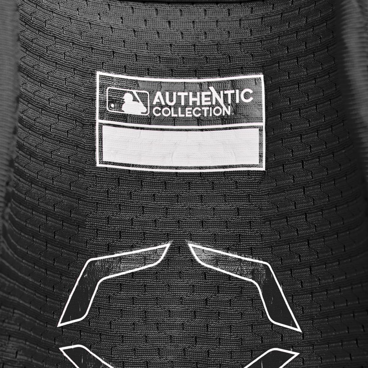 Close-up of a black EvoShield PRO-SRZ 2.0 Batter's Elbow Guard (WB572600) fabric featuring the MLB Authentic Collection label and white stitching details.