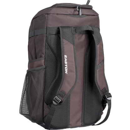 A black Worth Pro Backpack (WBA004) by Worth is shown from the back, featuring two padded adjustable shoulder straps, mesh side pockets, and a top carrying handle.