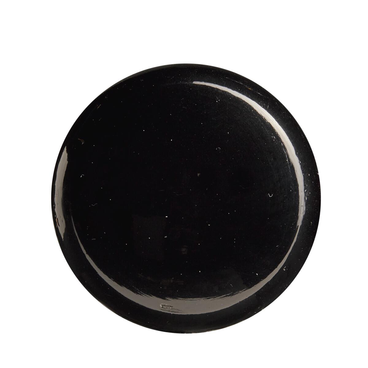 A round, glossy black plate seen from above, set against a white background, evokes the sleek finish of the Louisville Slugger Youth Prime CY22 Christian Yelich Maple Wood Baseball Bat (WBL2699010).