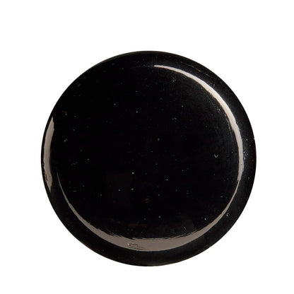 A round, glossy black plate seen from above, set against a white background, evokes the sleek finish of the Louisville Slugger Youth Prime CY22 Christian Yelich Maple Wood Baseball Bat (WBL2699010).