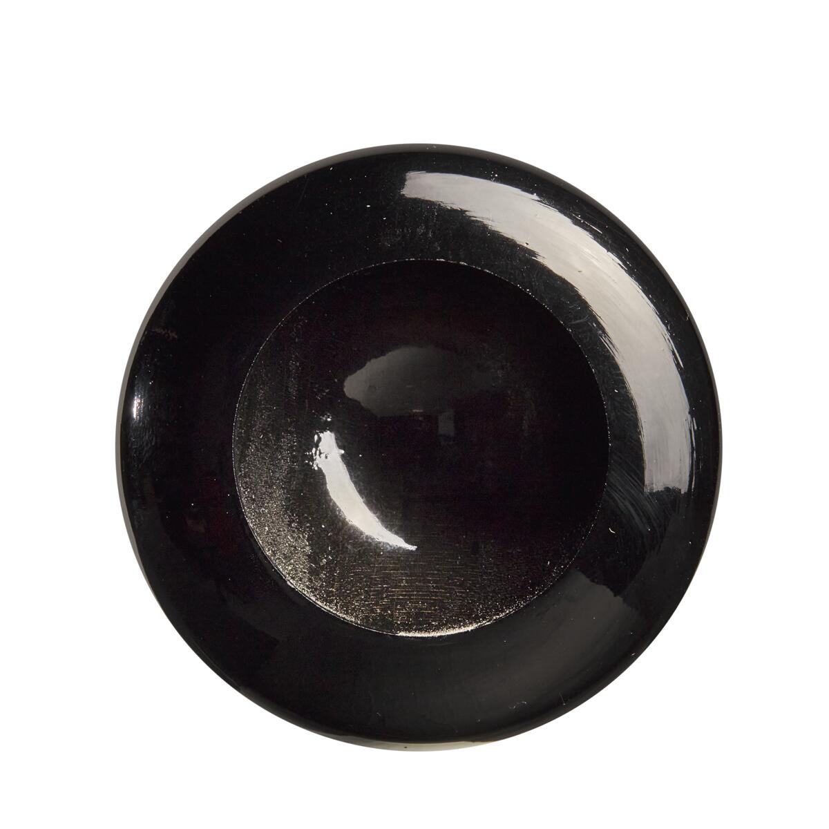 A shiny, black, round bowl is viewed from above against a white background. Its reflective surface gleams like the polished finish of a Louisville Slugger Youth Prime CY22 Christian Yelich Maple Wood Baseball Bat. The bowl is empty.