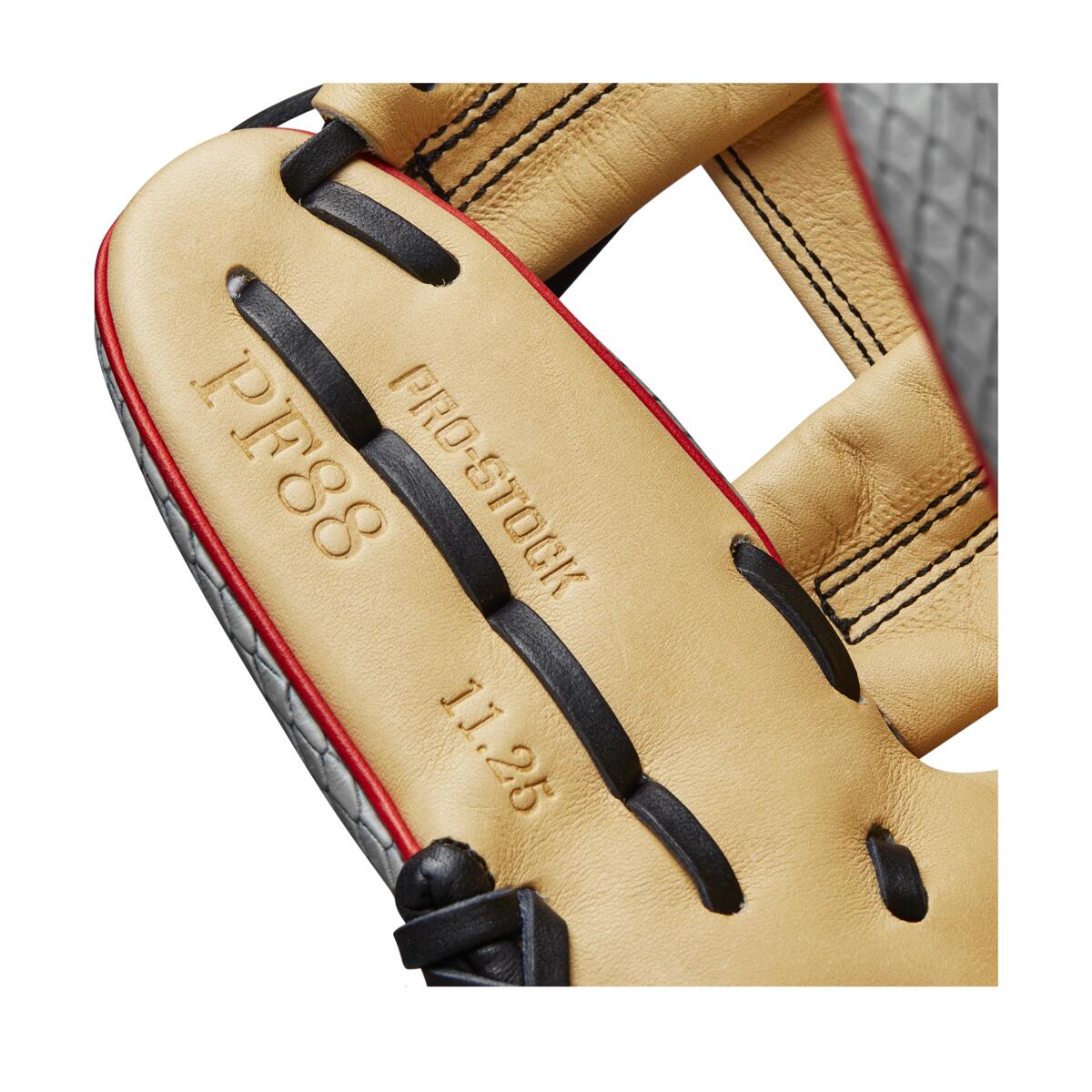 Close-up of the Wilson A2000 PF88SS 11.25" SuperSnakeSkin Baseball Glove (WBW1009811125) in tan leather, showing embossed PRO-STOCK, P.F.88, and 11.25 text with black laces, red trim, and Pedroia Fit technology from Wilson.