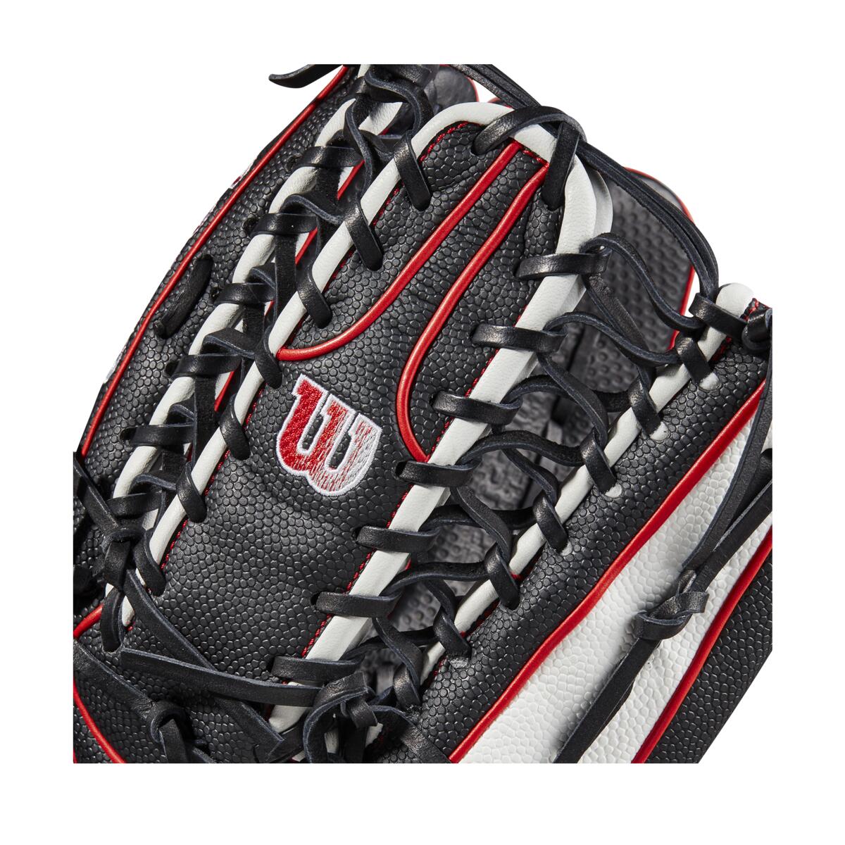 Close-up of the Wilson A2000 OT7SS 12.75" SuperSkin Baseball Glove in black with red and white accents, detailed leather lacing, stitched W logo, and lightweight durable SuperSkin.