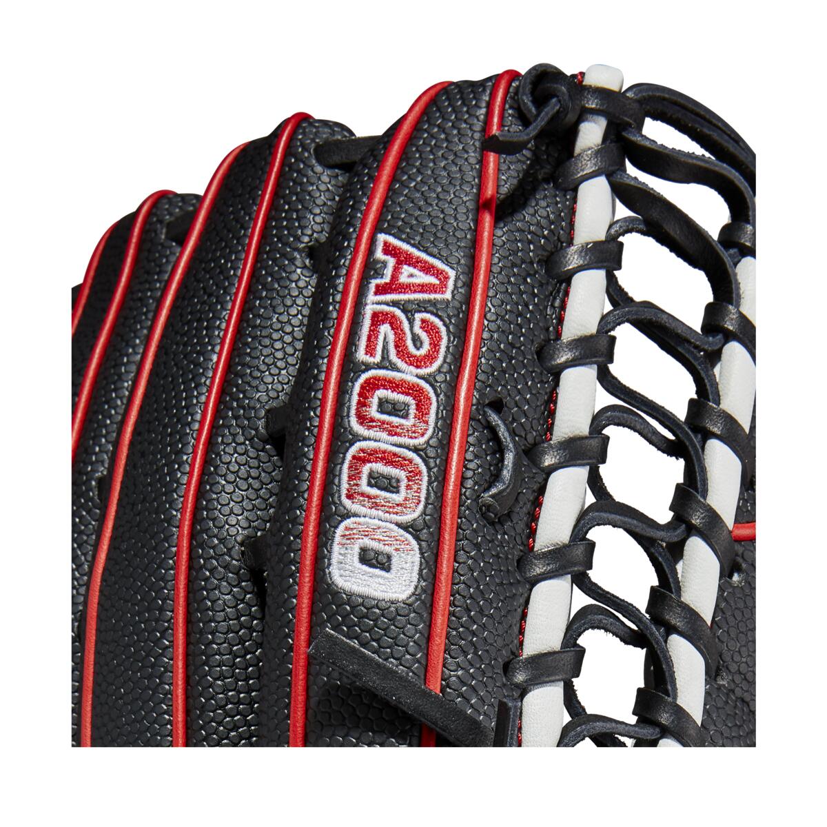 Close-up of the Wilson A2000 OT7SS 12.75" SuperSkin Baseball Glove (WBW1009871275) in black leather with red and white stitching, black laces, detailed texture, and advanced Spin Control Technology.