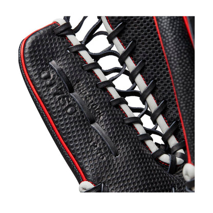Close-up of the Wilson A2000 OT7SS 12.75" SuperSkin Baseball Glove (WBW1009871275), a black outfield glove with red and white laces, detailed stitching, webbing, and innovative SuperSkin material by Wilson.