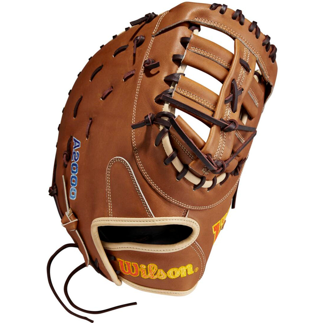 The Wilson A2000 AC4 12.5" Amanda Chidester GM Fastpitch First Base Mitt (WBW101017125) features brown Pro Stock leather, black and tan laces, an open web, and visible Wilson branding on the thumb and pinky.