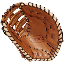 The Wilson A2000 AC4 12.5" Amanda Chidester GM fastpitch first base mitt (WBW101017125) features brown Pro Stock leather, black laces, and cream trim, shown from the inside with visible palm and finger slots.