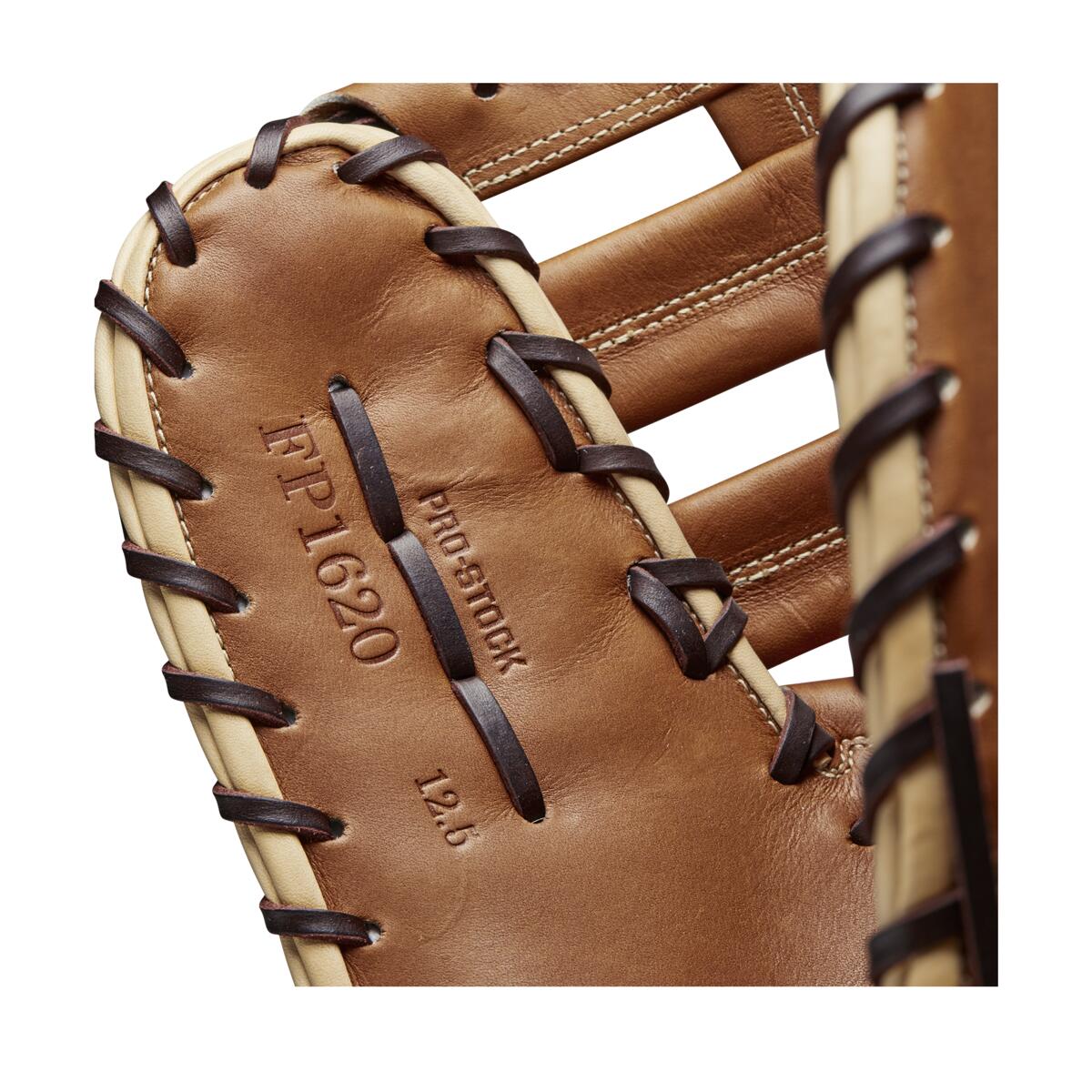 Close-up of the Wilson A2000 AC4 12.5" Amanda Chidester GM Fastpitch First Base Mitt (WBW101017125), made of brown Pro Stock leather with dark laces and “PRO STOCK, FP-1620, 12.5” stamped on the glove—modeled after Amanda Chidester’s design.
