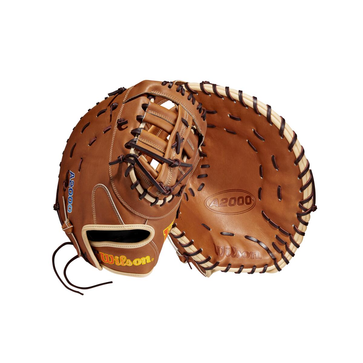 Two brown Wilson A2000 AC4 12.5" Amanda Chidester GM Fastpitch First Base Mitts by Wilson, with black laces, are shown: one displays the branded outer side, the other reveals the inner catching pocket and webbing.