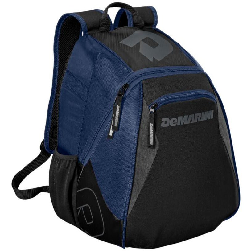 The DeMarini Voodoo Junior Backpack (WTD9106) in black and dark blue features multiple zippered compartments, a side pocket, top handle, padded adjustable shoulder straps, and displays the DeMarini logo and name on the front and side.