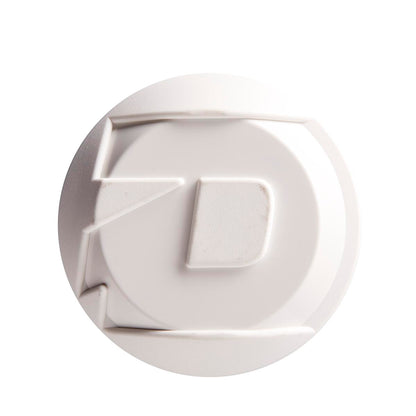 A white, round plastic object with raised geometric shapes and lines, resembling the texture of the DeMarini 2022 Chris Larsen Nautalai 12" Endload NSA/USSSA Slowpitch Softball Bat (WTDXCLU-22), viewed from above on a white background.