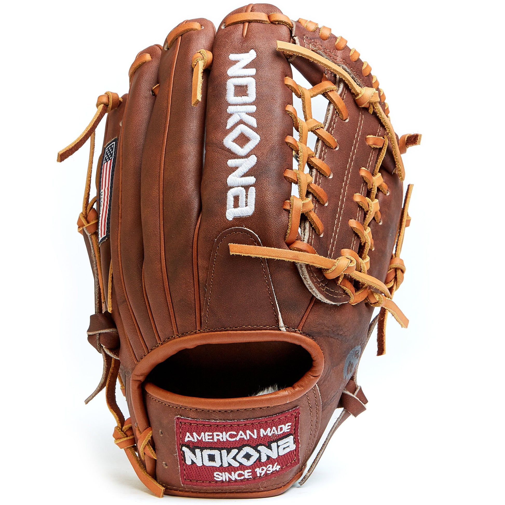 The Nokona Walnut 11.5" Baseball Glove: W-1150 features brown Walnut Crunch leather, tan laces, white stitching, an American Made patch on the wrist, and white Nokona embroidery—perfect for infield play.