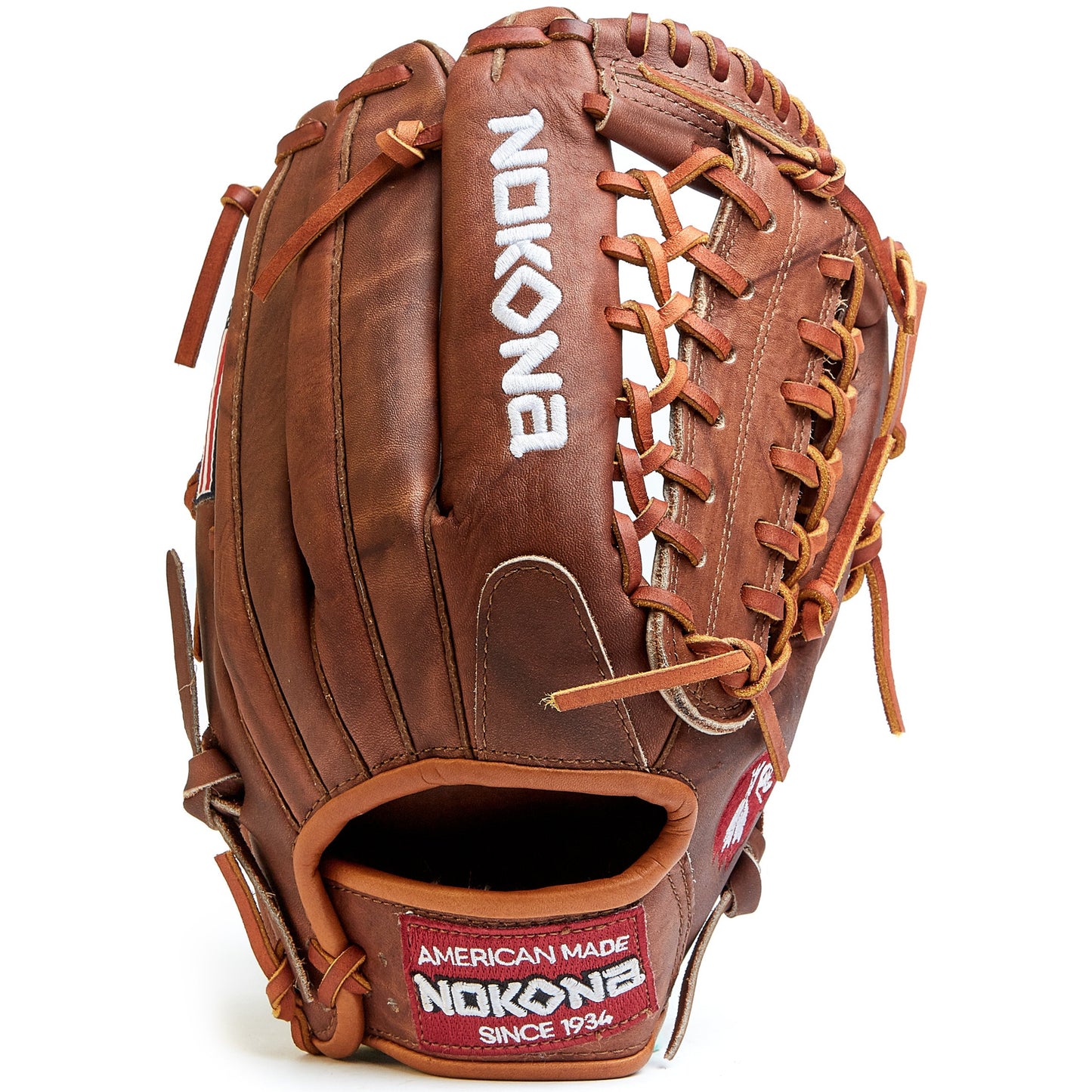 The Nokona Walnut 12.75" Baseball Glove: W-1275 features durable Walnut Crunch leather, tan laces, visible stitching, and "Nokona" embroidered in white with a red American Made patch—highlighting Nokona's handcrafted glove excellence.
