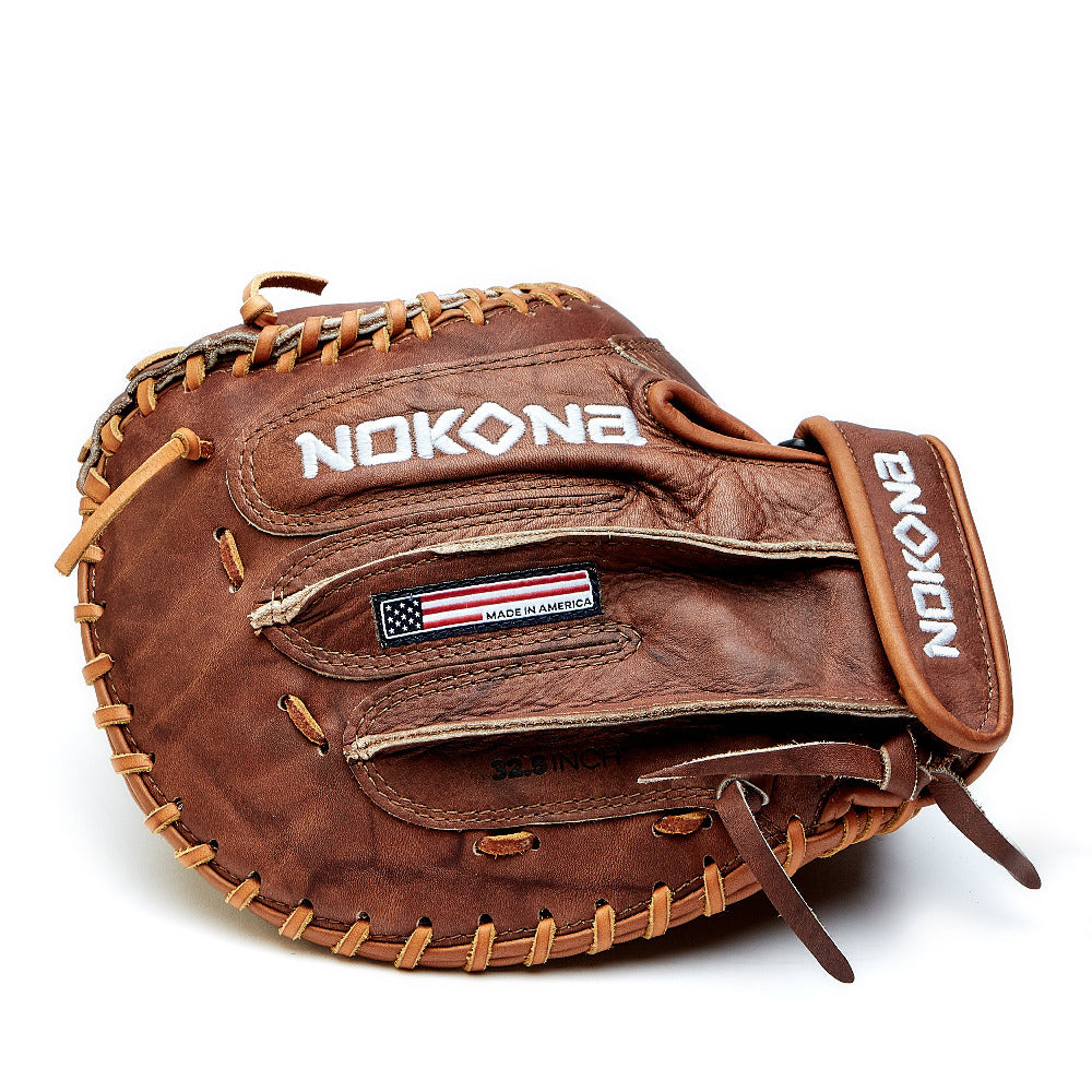 The Nokona Walnut 32.5" Fastpitch Catcher's Mitt (W-V3250) features Walnut Crunch leather, tan lacing, visible stitching, an American flag patch, and is shown on a white background.