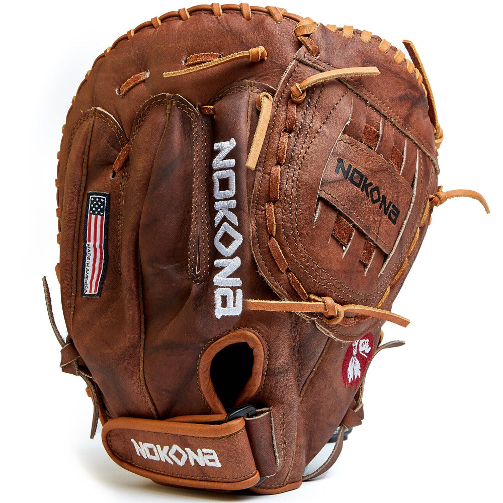The Nokona Walnut Classic 14" Softball First Base Mitt: W-N80 features brown Walnut Crunch leather, visible stitching, the Nokona logo, an American flag patch, and a red buffalo emblem. The open mitt showcases its detailed pocket and laces.