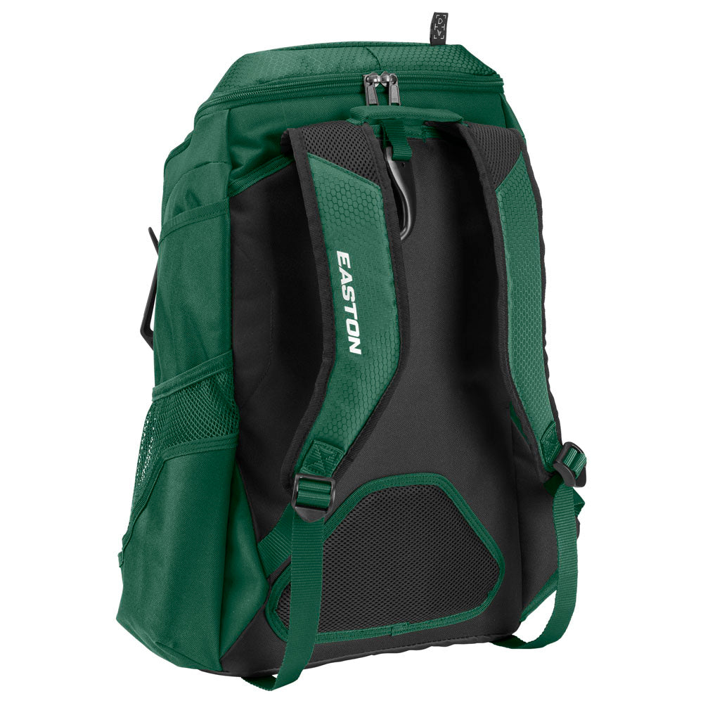 The Easton Walk Off NX Backpack (A159059) is a green and black equipment bag with mesh side pockets, padded shoulder straps, and "EASTON" printed in white on one strap. The backpack stands upright, showcasing its back and straps.