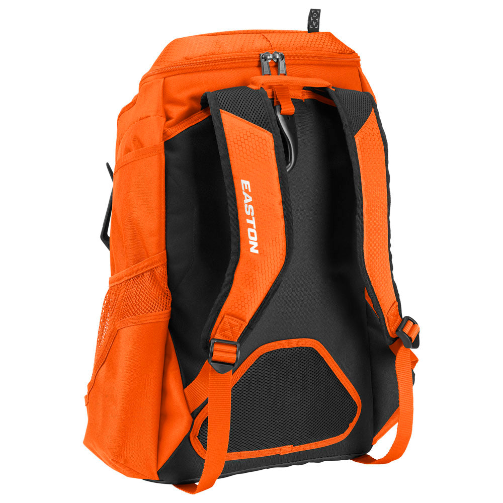 The Easton Walk Off NX Backpack (A159059) is an orange and black softball backpack with padded shoulder straps, mesh side pockets, and "Easton" printed on one strap, shown from the back.