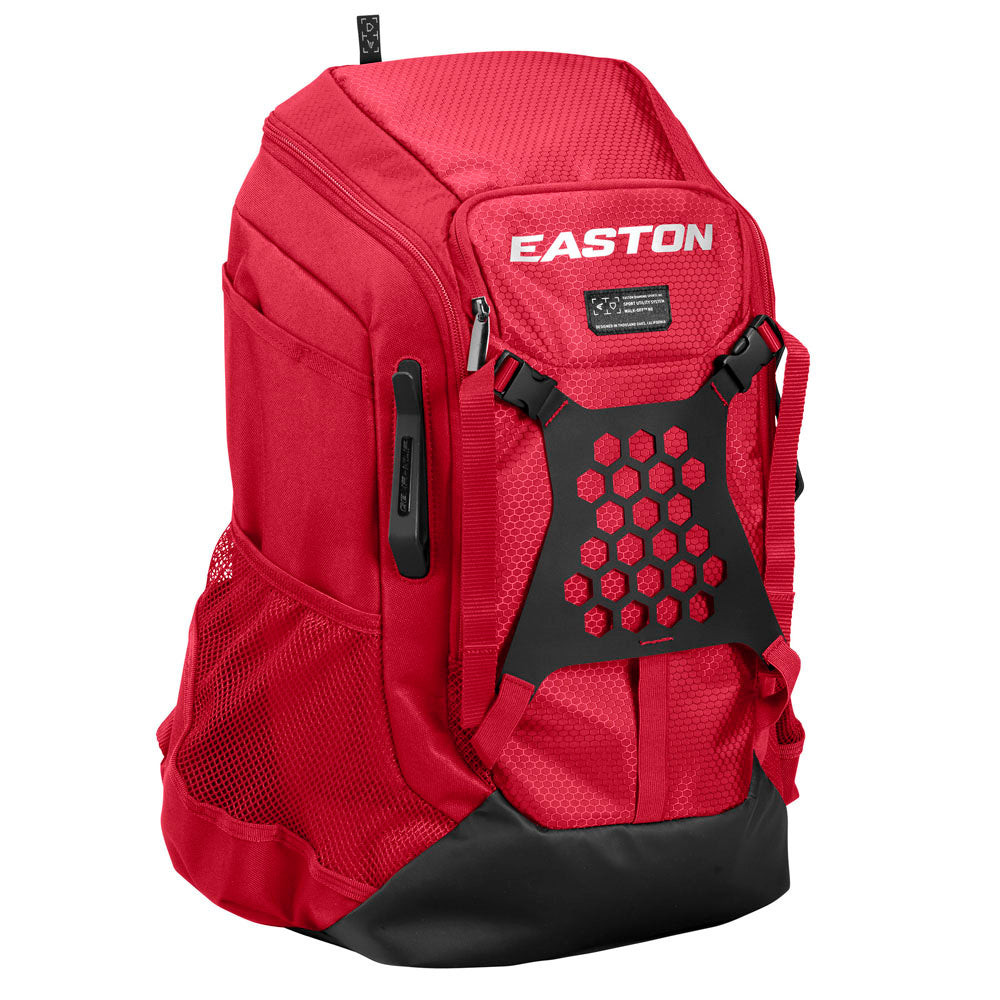 The Easton Walk Off NX Backpack (A159059) by Easton features a red design with black accents, side mesh pockets, a top zippered compartment, and a hexagonal black pattern on the front, shown on a white background.