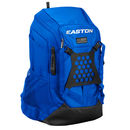 The Easton Walk Off NX Backpack (A159059) by Easton is shown in blue with a black honeycomb-patterned front panel, mesh side pockets, and a zippered top compartment against a white background.