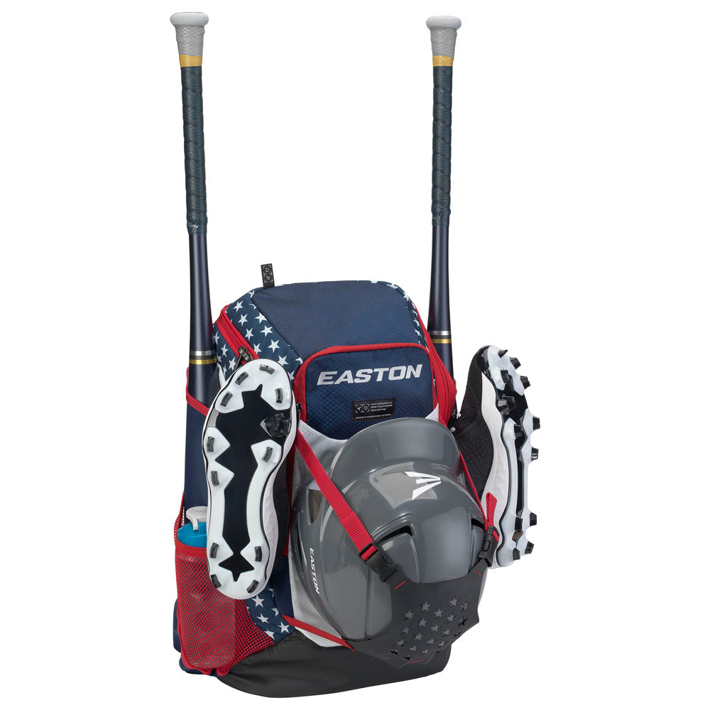 The Easton Walk Off NX Backpack (A159059) in navy blue, red, and gray holds two bats, cleats, and a helmet, features mesh side pockets, and has white stars decorating the lower section. Brand: Easton.