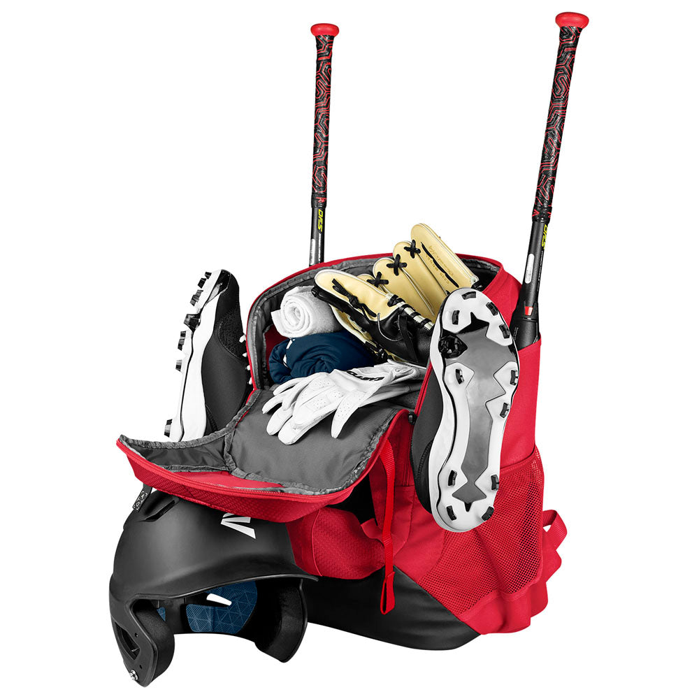 The Easton Walk Off NX Backpack (Easton A159059) in red and gray holds two bats, a pair of cleats, helmet, gloves, and rolled-up clothing—all visible inside or attached to the bag.
