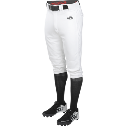 A person is wearing Rawlings Adult Launch Knicker Baseball Pants (LNCHKP) with a Rawlings logo on the left thigh, paired with black knee-high socks, black cleats, and a black belt. The upper body is not visible.