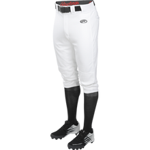 A person shown from waist to feet against a white background wears Rawlings Youth Launch Knicker Baseball Pants (YLNCHKP) with a black belt, black knee-high socks, and black baseball cleats.
