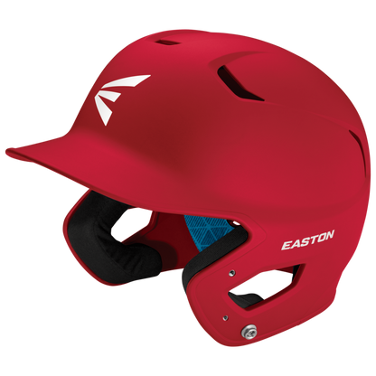 The Easton Z5 2.0 Grip Matte Solid Batting Helmet (Z52MT) comes in red with black padding, ventilation holes, a white Easton logo, a protective ear flap, and is NOCSAE certified for safety.