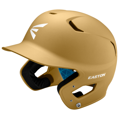 The Easton Z5 2.0 Grip Matte Solid Batting Helmet (Z52MT) features a gold matte finish, ear protection, ventilation holes, and a white front-left logo. NOCSAE certified for safety, it’s shown against a plain light background.