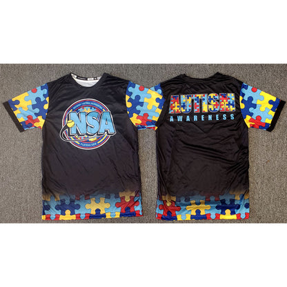The DSG Apparel National Softball Association NSA Autism Awareness Sublimated Short Sleeve Shirt features black fabric with colorful puzzle piece accents, an NSA logo on the front, and "Autism Awareness" in bold multicolored letters on the back.
