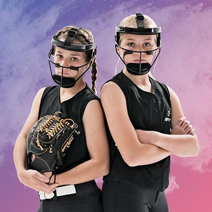 Two young softball players in black uniforms and Rip It Defense Pro Softball Fielder's Masks (DGBO) by Rip It stand side by side with serious expressions, eye black, a glove, and a pink-purple smoky background behind them.