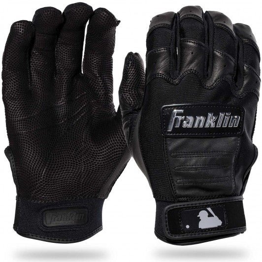 The Franklin CFX Pro Full Color Chrome Adult Batting Gloves 205 in black, made from sheepskin leather, feature textured grip palms, Velcro wrist straps, and a small MLB logo on the wrist. Shown palm-up and palm-down.