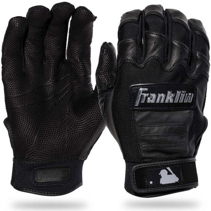 The Franklin CFX Pro Full Color Chrome Adult Batting Gloves 205 in black, made from sheepskin leather, feature textured grip palms, Velcro wrist straps, and a small MLB logo on the wrist. Shown palm-up and palm-down.