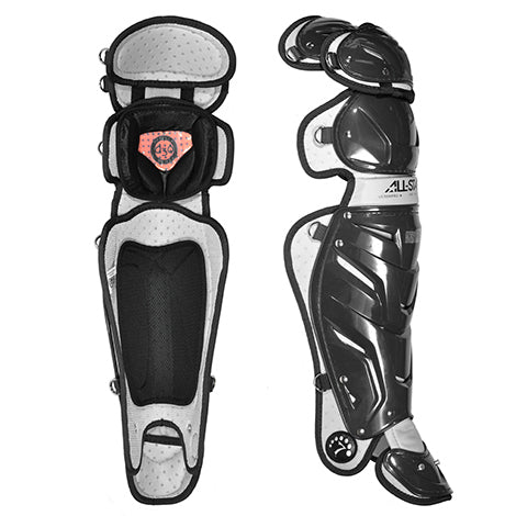 The All Star System7 Pro Catcher's Leg Guards (LG30SPRO / LG30WPRO) are shown in black and gray, with one displaying soft interior padding and the other revealing a durable, shiny outer shell with segmented plates for full leg protection.