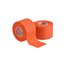 Two rolls of Mueller M Tape Athletic Tape (MTAPE) by Mueller are shown on a white background—one upright, one unrolled. With a cotton backcloth and bright orange color, they're perfect for sports medicine applications.