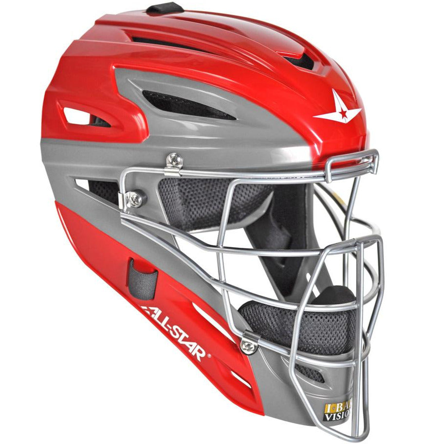 The All Star System7 Axis Hockey Style Catcher's Helmet (MVP2500/MVP2510) features a red and gray design, metal face guard, ventilation holes, padded interior, white star logo on the front, and ALL-STAR branding—perfect for youth catchers.