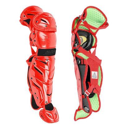 Two All Star System7 Axis Catcher's Leg Guards are shown—one displays the front with padding, knee caps, and LINQ hinge system; the other reveals the interior with straps and green cushioning.