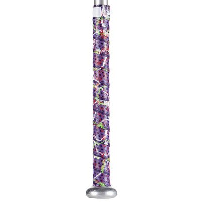 A metal baseball bat features a Lizard Skins Specialty 1.1mm Durasoft Polymer Bat Grip in purple with a colorful, cartoon-style design—eyes and whimsical patterns—covering most of the handle for comfort and style.