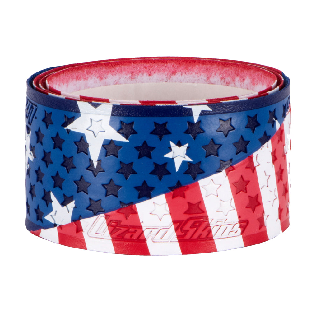 The Lizard Skins Specialty 1.1mm Durasoft Polymer Bat Grip showcases a USA flag design and provides comfort and control with its 1.1mm thickness.