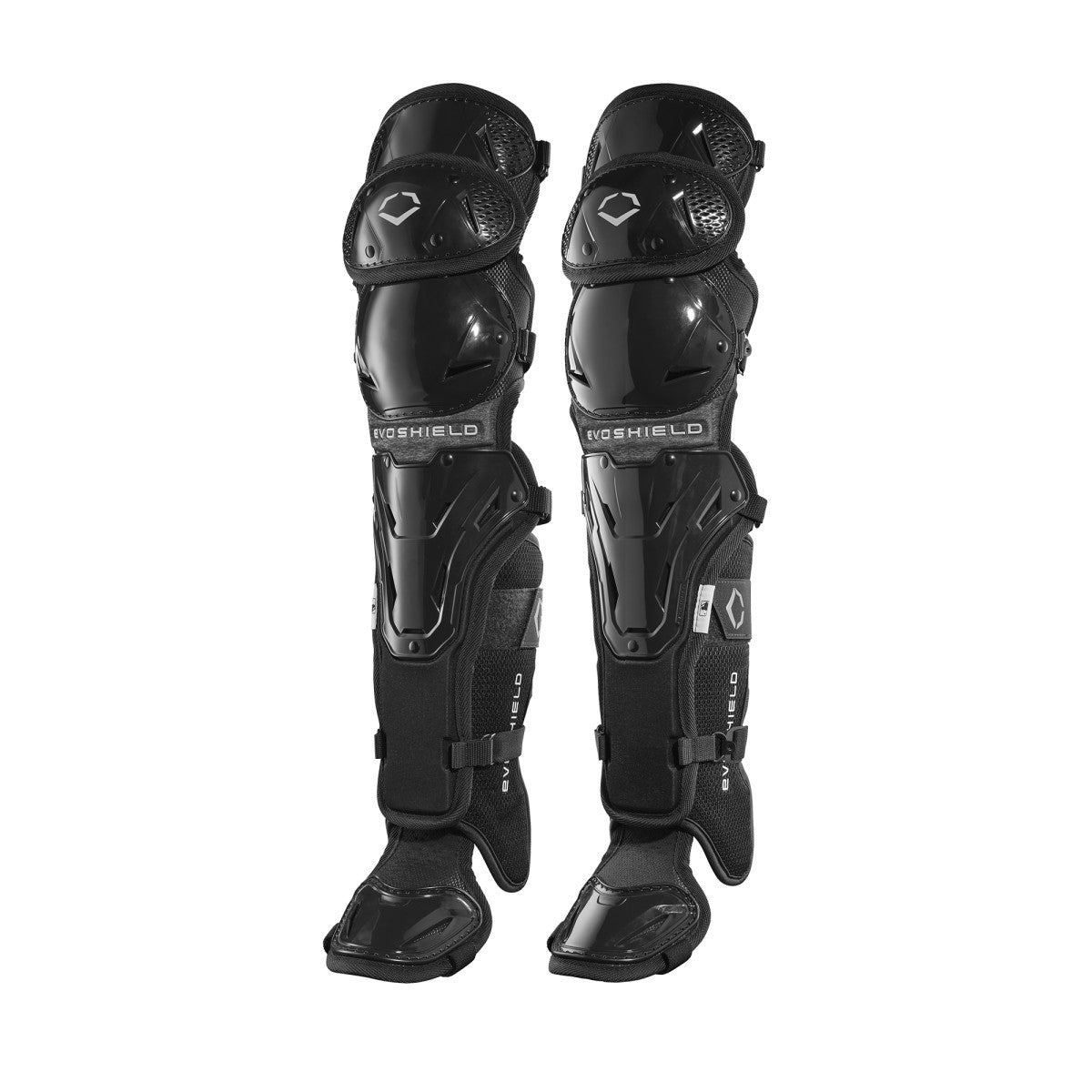 The EvoShield Pro-SRZ Gel-to-Shell™ Catcher's Lower Leg Guards (WB570800/WB571030) by EvoShield are black guards with adjustable straps and a hard shell, inspired by catcher’s gear, designed for sports or motorcycling safety.