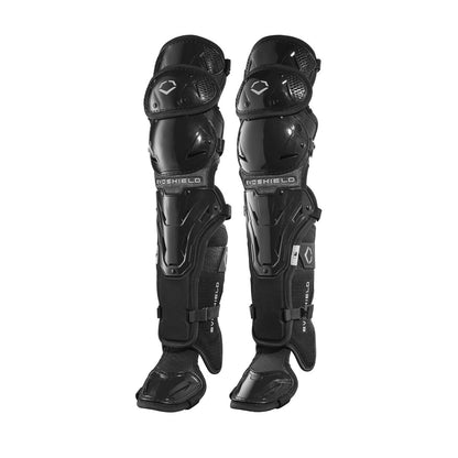 The EvoShield Pro-SRZ Gel-to-Shell™ Catcher's Lower Leg Guards (WB570800/WB571030) by EvoShield are black guards with adjustable straps and a hard shell, inspired by catcher’s gear, designed for sports or motorcycling safety.
